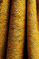 Golden yellow snake skin texture with detailed scales pattern showing natural reptile surface for backgrounds and design projects.