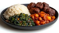 Traditional Middle Eastern meal with rice, falafel, tabbouleh salad and roasted vegetables served on dark plate for restaurant menu design.