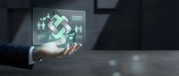 Hand holding holographic display showing interconnected people icons and arrows symbolizing teamwork, collaboration, and sustainable business growth strategy.