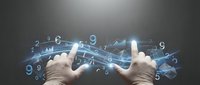 Hands holding digital tablet with glowing blue numbers, graphs and data visualization flowing across screen, representing technology, analytics, business intelligence and financial data management.