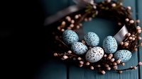 Speckled blue quail eggs nestled in rustic wreath with delicate pink berry branches on dark teal wooden background, moody spring composition.