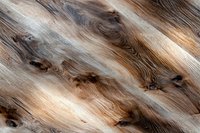 Diagonal wooden texture with natural grain pattern in brown and gray tones showing knots and swirls. Abstract background for interior design projects.