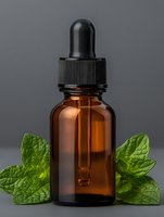 Amber glass dropper bottle filled with essential oil or herbal extract, surrounded by fresh green mint leaves on neutral background for wellness and natural remedy applications.