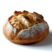 Fresh baked artisanal sourdough bread loaf with crispy golden crust and flour dusting on white background, close up view for food photography and menu design.