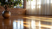 Warm sunlight streaming through curtains casting dramatic shadows on wooden floor, with decorative potted plant in ceramic vase against exposed brick wall background.