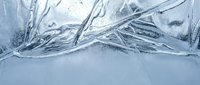 Abstract ice crystal formations with delicate frozen patterns and translucent textures creating winter nature background for seasonal designs.