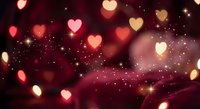Romantic heart-shaped bokeh lights floating on warm burgundy background with sparkling stars for Valentine's Day celebrations and love themes.