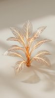 Elegant glass plant sculpture with translucent leaves and warm golden lighting on neutral background for luxury home decor and artistic design projects.