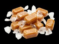 Wrapped caramel candies pile isolated on transparent background, ready for stickers, print on demand, T-shirt design, clipart, and sublimation projects.