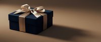 Elegant black gift box with golden ribbon and bow on warm brown background for luxury present wrapping and special occasion celebrations.