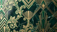 Elegant art deco seamless pattern with gold ornamental elements on dark green marble background for luxury interior design and textile applications.