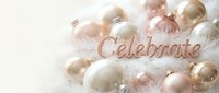 Elegant Christmas wreath with pastel pink and gold ornaments, soft white feathers, and a rose gold Celebrate text on a light background.