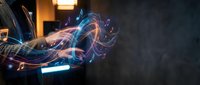 Hands holding glowing digital tablet with flowing neon light waves and data streams, representing technology, innovation, and digital transformation for business and design projects.