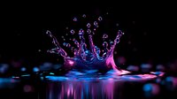 Crown-shaped liquid splash with neon pink and blue illumination against dark background, water drops frozen in motion creating dynamic reflection on surface.