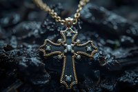 Ornate golden cross pendant with turquoise inlays and intricate filigree details on dark stone background, showcasing vintage religious jewelry craftsmanship.