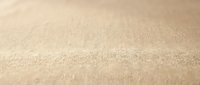 Natural beige linen fabric texture with soft weave pattern for backgrounds, textile design, and organic material concepts in neutral earth tones.
