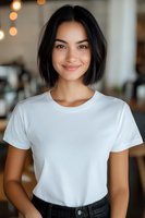 Young Asian woman with short dark hair wearing white t-shirt and jeans smiling warmly at camera. Soft bokeh lights in background create cozy atmosphere.