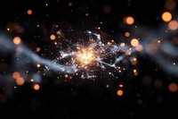 Bright sparkler emitting golden light and sparks against dark background with blurred bokeh lights creating magical atmosphere for celebration and holiday designs.
