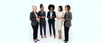 Diverse group of five professional women in business attire standing together on white background, representing corporate teamwork, leadership and workplace diversity for business communications.