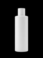 White plastic cosmetic bottle with flip cap, isolated on transparent background. Ready for mockup, packaging design, beauty branding, print on demand, and product presentation.