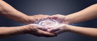 Diverse hands unite around glowing digital shield symbol representing cybersecurity protection, teamwork and collaborative data safety in modern technology.