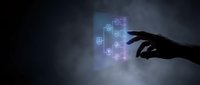 Hand touching glowing digital technology icons floating in air against dark background, representing innovation, connectivity, and future digital transformation.