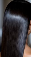 Sleek straight black hair with glossy shine effect shown from behind on Asian woman wearing crystal earring, demonstrating professional hair care treatment result.