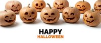 Group of carved jack-o-lantern pumpkins with glowing faces arranged on white background for seasonal autumn holiday celebrations and festive decorations.