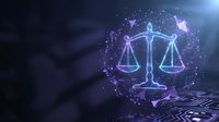 Digital justice scales hologram glowing with purple light and particles over laptop keyboard representing legal technology and cyber law enforcement.
