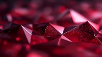 Shimmering red crystal geometric shapes create abstract luxury background with bokeh effect and metallic surface texture in dark burgundy tones.