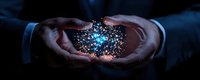 Glowing blue digital particles floating between businessman hands in dark setting, representing digital transformation and future technology innovation.
