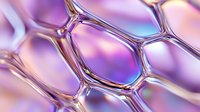 Macro view of iridescent soap bubble structure with hexagonal pattern in purple and pink tones showing surface tension and light refraction effects.