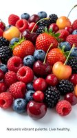 Fresh mixed berries collection with strawberries, blueberries, raspberries, blackberries and cherries on white background for healthy eating concepts.