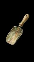 Vintage garden trowel with wooden handle isolated on transparent background, ready for clipart, print-on-demand, and design projects.