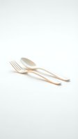 Wooden fork and spoon set isolated on white background for eco-friendly dining and sustainable kitchen utensils design projects.