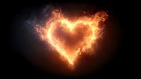 Fiery heart shape made of flames and smoke on black background for romantic designs and love concepts.