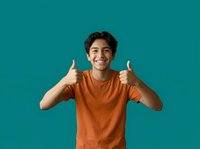 Young man with dark hair and olive complexion wearing an orange t-shirt, giving double thumbs up gesture against teal background. Suitable for positive feedback, approval, success, and motivation concepts.