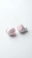 Pair of white and pink wireless earbuds with charging case isolated on white background, ready for product design, marketing materials, and technology presentations.