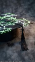Graduation cap with glowing network connections symbolizing digital education, online learning and academic achievement in technology era.