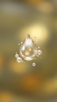 Golden water droplet with floating bubbles on warm blurred background for skincare cosmetics and wellness product design.