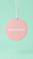 Pink round discount tag hanging on white string against mint green background, sale concept for retail, shopping, and promotional design.