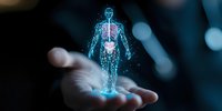 Glowing holographic human anatomy figure floating above open palm shows internal organs with futuristic blue light effect against dark background.
