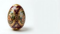 Ornate decorative egg with intricate floral patterns and vintage motifs on burgundy background, traditional folk art style for Easter celebrations and holiday decor.