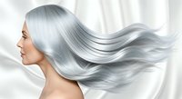 Woman with long, flowing silver hair in profile against white fabric background, showcasing hair care, salon treatments, and beauty products for advertising and cosmetic marketing.