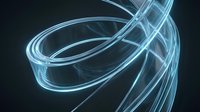 Glowing neon light trails swirl and twist in dynamic motion against dark background, creating abstract flowing energy waves for modern design projects.