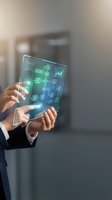 Businessman hands holding transparent digital tablet with glowing flowchart diagram in modern office environment for business process automation.