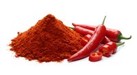 Red chili pepper powder pile with fresh hot peppers isolated on white background for cooking spice seasoning culinary ingredient food preparation.