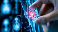 Glowing red inflammation point on knee joint x-ray scan with doctor hand pointing at painful area. Medical diagnostic visualization in blue tones.