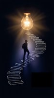 Businessman climbing glowing book staircase toward bright lightbulb representing knowledge, education, success and innovation in dark atmospheric setting.