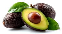 Fresh ripe avocados with one cut in half showing creamy green flesh and brown seed, surrounded by green leaves on white background.